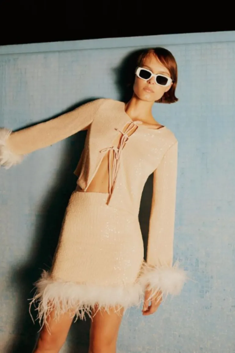 Tops<CULT MIA SEQUINED TOP WITH FEATHER CUFF Nude